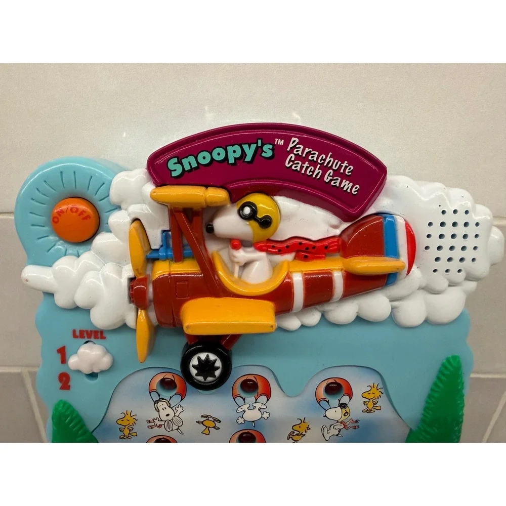 Tiger Electronics Snoopy Parachute Catch Game 1999 Peanuts OS Green Vintage Toy